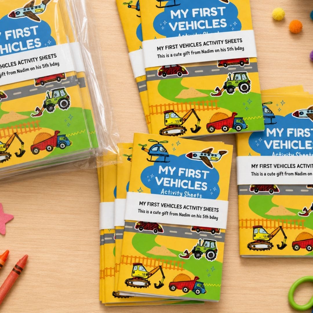 First Vehicles Activity Sheets displayed on a daycare activity table with crayons, scissors and preschool supplies